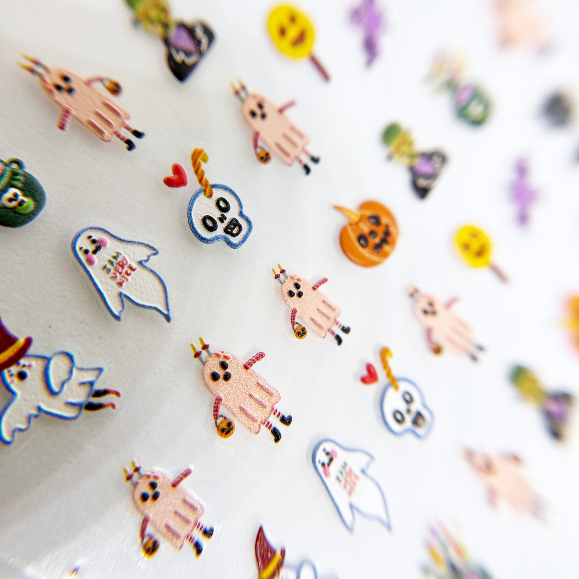 Ghost Party Nail Stickers - Colorful Raised Texture Nail Stickers with Cartoon Halloween Characters (Ghosts, Witches, Pumpkins, and Skulls) on White Background