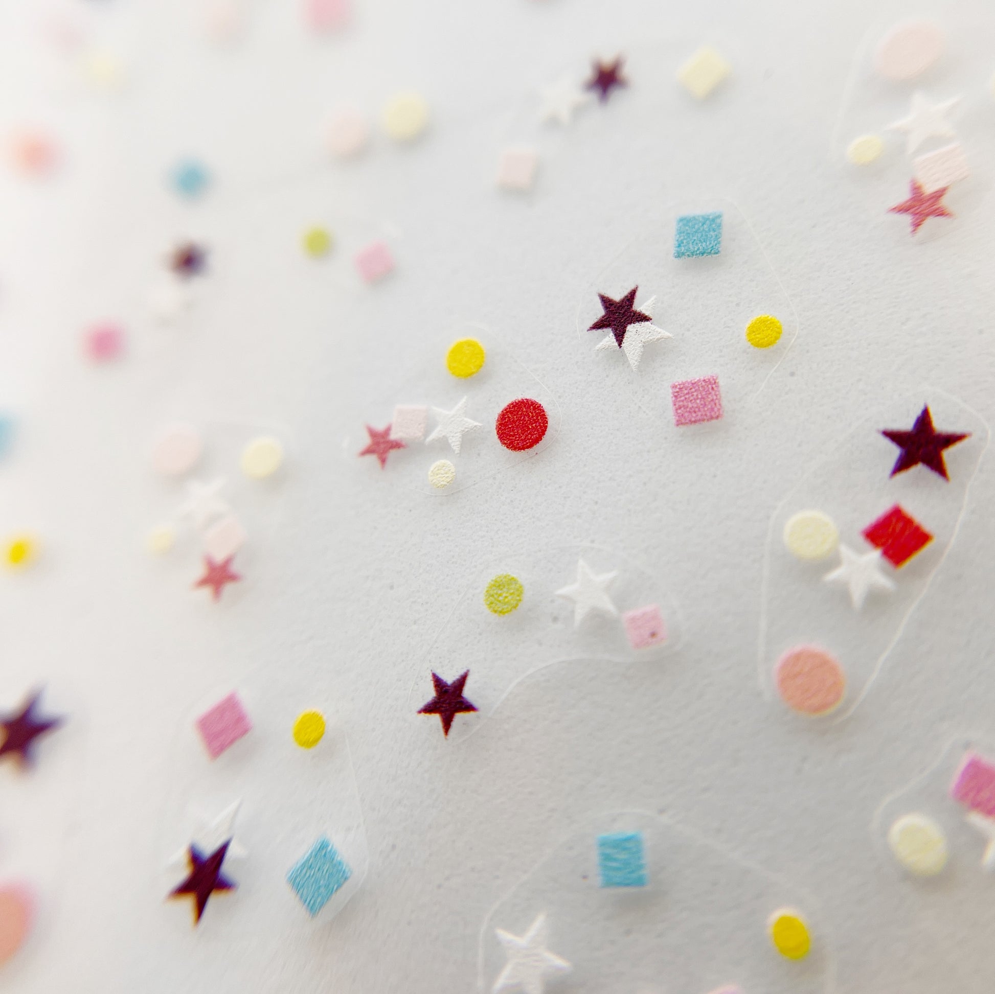 Terrazzo Confetti Nail Stickers - Flat Nail Stickers Featuring a Variety Multi-Color of Terrazzo-Inspired Shapes, Including Stars.