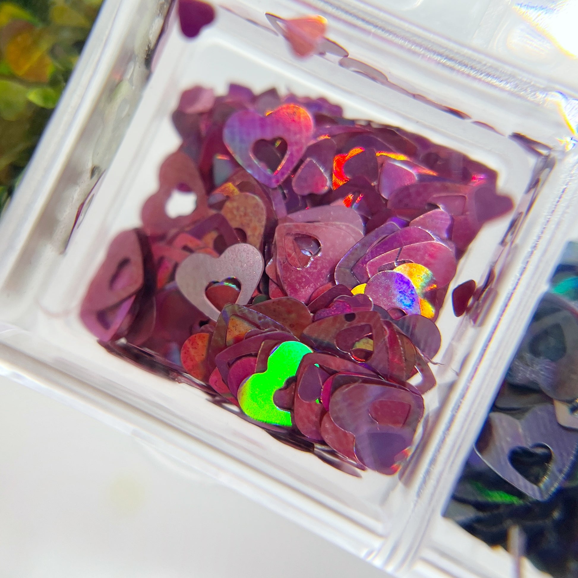 Close-Up of Hollow Hearts Glitter Mix - Detailed View of Multi-Size Colorful Hollow and Mini Heart-Shaped Glitters in Vibrant Colors