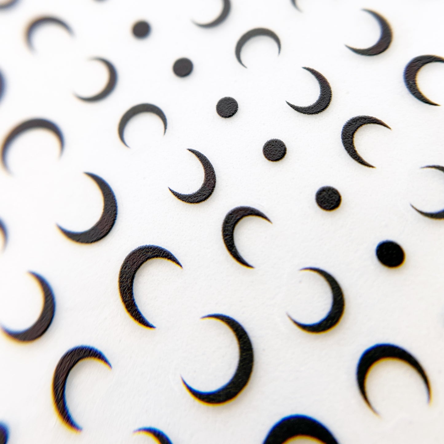 Crescent Moon Nail Stickers - Flat Black Moon Motifs on Clear Sheet, Presented on a White Background.