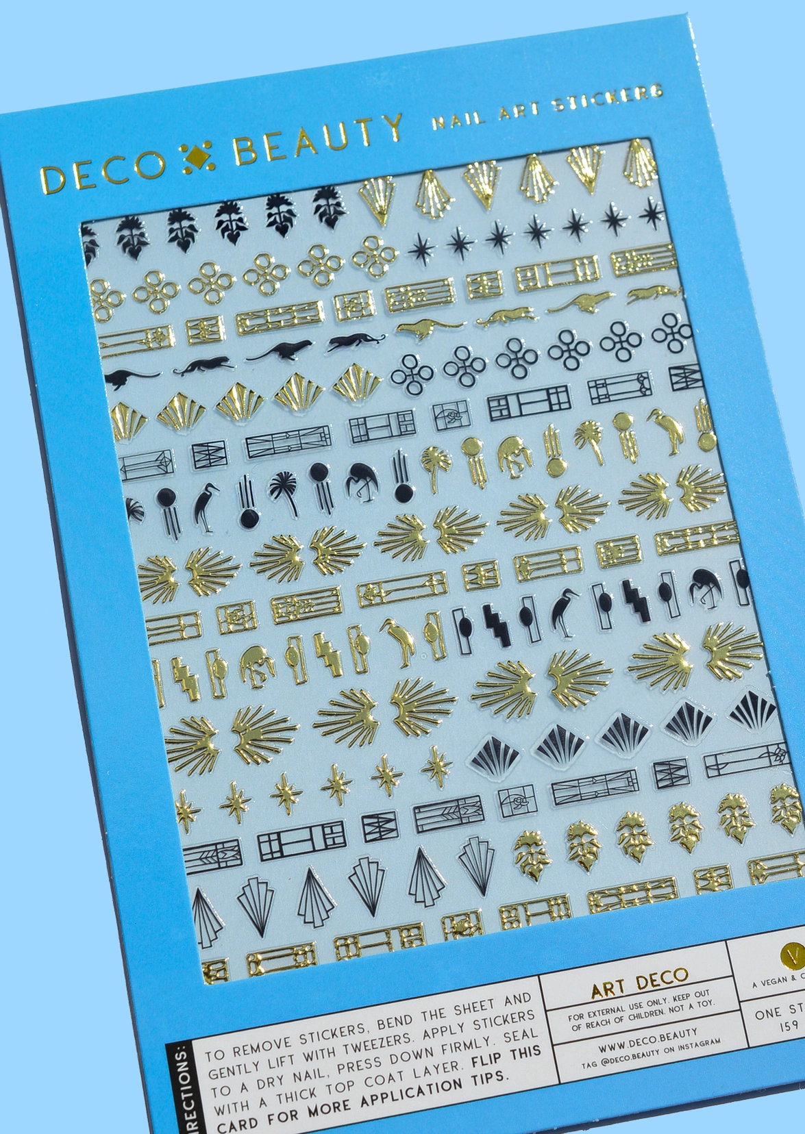 Gold and black nail stickers in a variety of art deco motifs. 