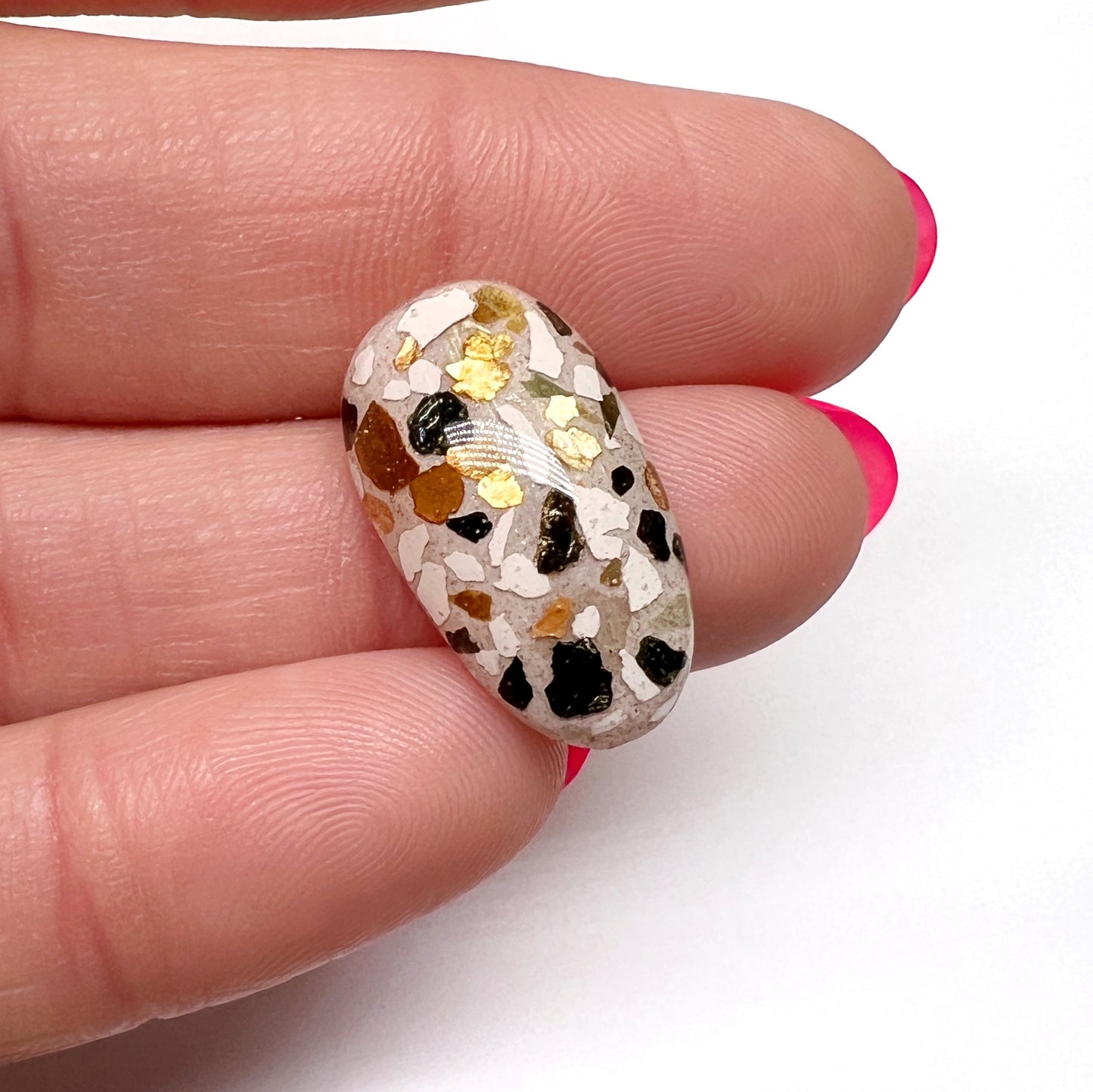 Multi-colored mica flakes for creating terrazzo style nail art. 