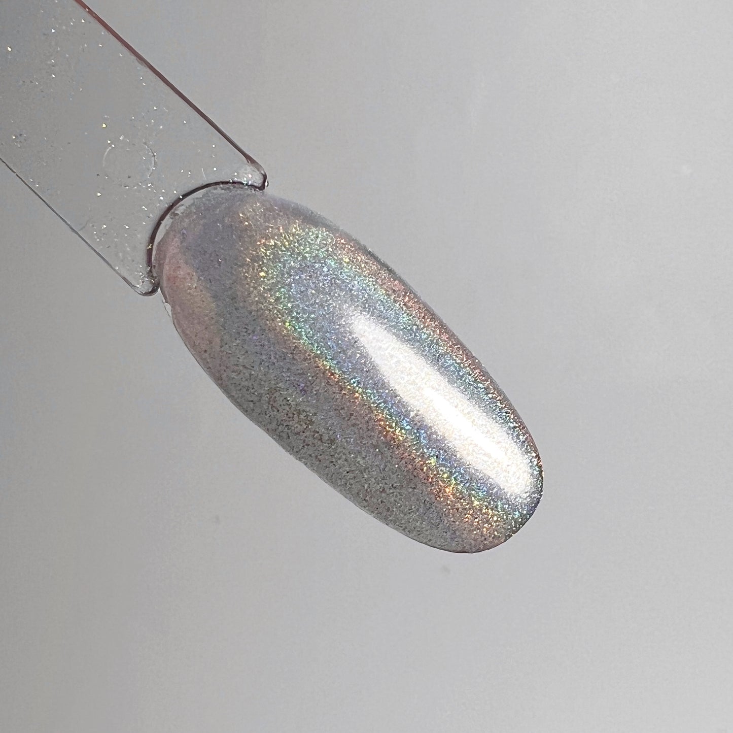 Chrome swatch on clar oval nail swatch stick. 