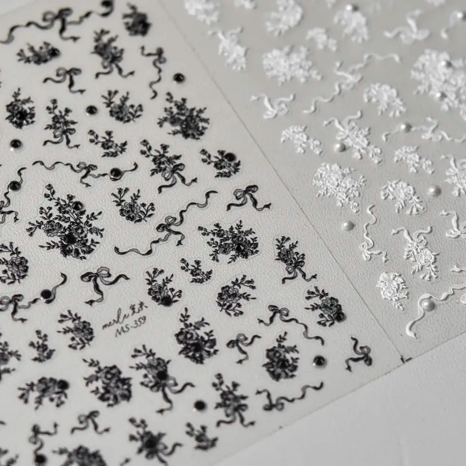 Lace and Pearl Nail Stickers - Raised Texture Lace Floral Design with 3D Pearl Detail, Featured in Both Black and White Variations on a Gray Background."
