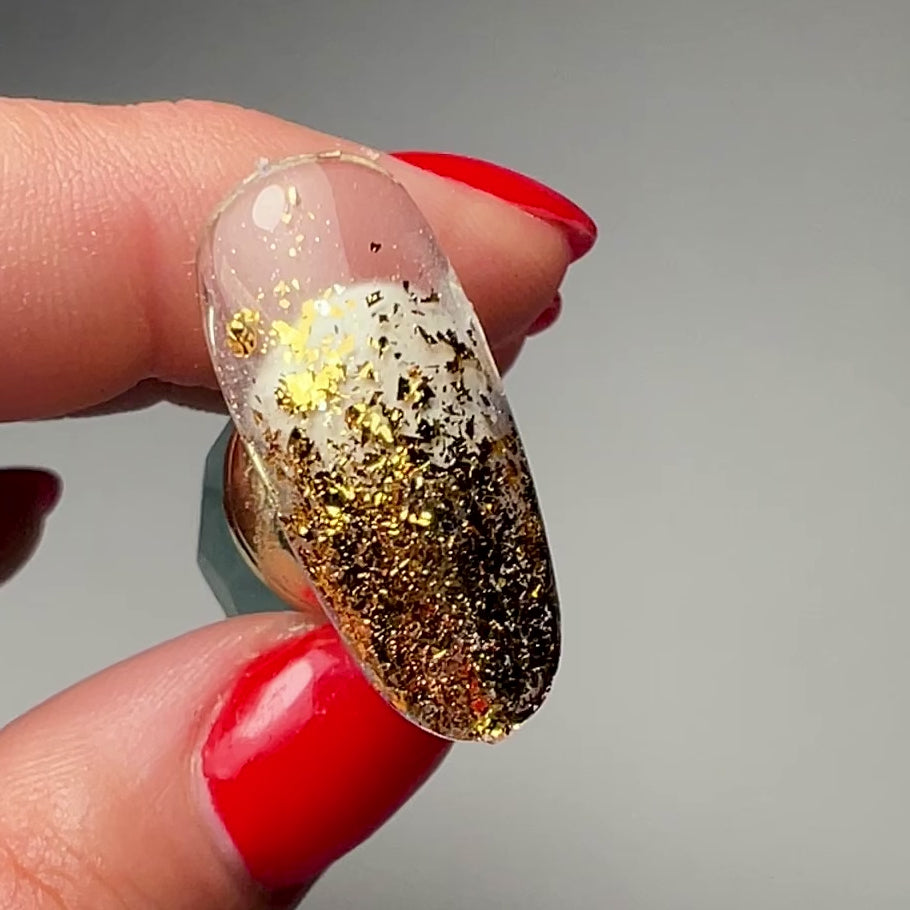 Video of decorated nail tip. 